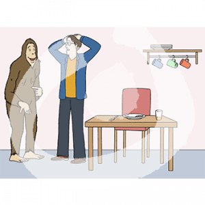 Eine erschrockene Person mit Händen über dem Kopf zusammengeschlagen steht neben einem Tisch. Sie guckt eine Person im Affenkostüm an.