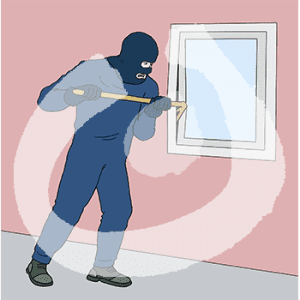 Eine vermummte Person steckt ein Brecheisen in die Kante eines Fensters.