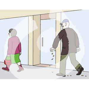 Eine Person steht neben einem Laden mit dem Rücken zu einer anderen Person. Diese Person lässt Erdnüsse fallen und folgt der ersten Person hinterher.