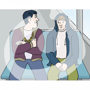 Eine ängstliche Person sitzt auf einer Bank in der Bahn. Daneben sitzt ein wütender Mann. Er guckt rüber, die Person guckt nach unten.