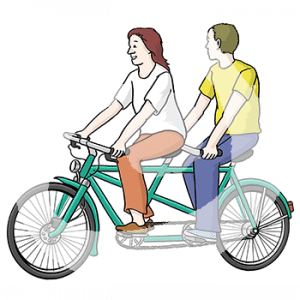 Zwei Personen auf einem Tandem.