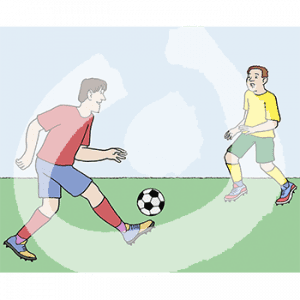 Ein Mann mit rotem Trikot hat einen Fußball auf dem Fuß. Davor steht ein Mann in gelbem Trikot.