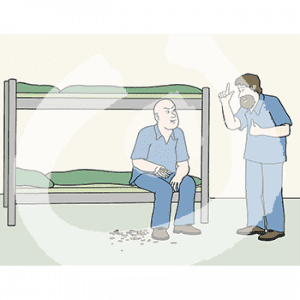 Zwei Personen in Sträflingskleidung. Eine sitzt auf einem Stockbett mit Erdnüssen in der Hand, auf dem Boden liegen Erdnussschalen. Davor steht die zweite Person und hebt einen Finger.