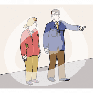 Ein Mann und eine Frau stehen nebeneinander und gucken sich an. Der Mann zeigt auf etwas.