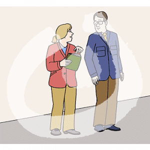 Ein Mann und eine Frau stehen nebeneinander. Die Frau zeigt auf ein Buch in ihrer Hand. Der Mann guckt auf das Buch.