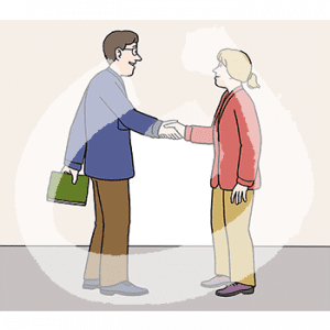 Zwei Personen stehen sich gegenüber und schütteln sich die Hände.