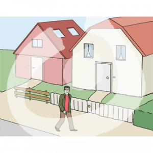 Zwei verschiedene Häuser nebeneinander. Auf dem Weg davor läuft eine Person.