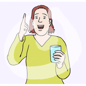 Eine fröhliche Frau in Portraitansicht hält einen Finger hoch. In der anderen Hand hat sie einen Becher.