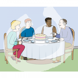 Vier Personen sitzen mit Tassen, Tellern und einer Torte um einen Tisch herum.