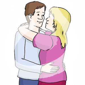 Zwei Personen umarmen sich und gucken sich an.