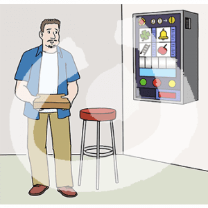 Ein Mann mit Pizzakarton in der Hand steht neben einem Spielautomaten.