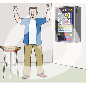 Ein fröhlicher Mann mit erhobenen Händen steht neben einem Spielautomaten.