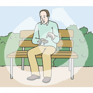 Ein Mann sitzt auf einer Parkbank und guckt auf eine Armbanduhr in seiner Hand.