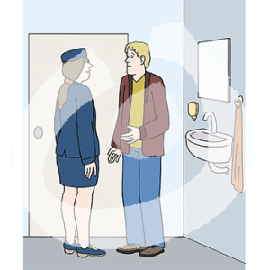 Eine Frau und ein Mann stehen sich im Bad gegenüber.