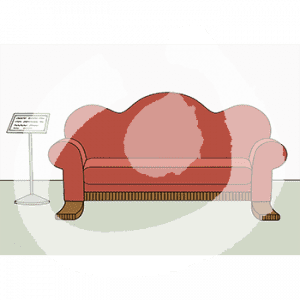 Ein rotes Sofa. Daneben ist ein Schild.