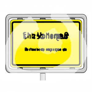 Ein Ortsschild mit Aufschrift.