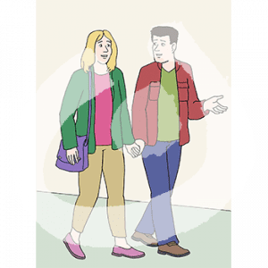 Ein Mann und eine Frau gehen Hand in Hand.