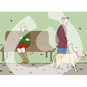 Eine Person sitzt auf einer Parkbank und hat die Arme um sich gelegt. Um sie herum liegen Blätter. Eine Person mit Hund läuft vorbei.