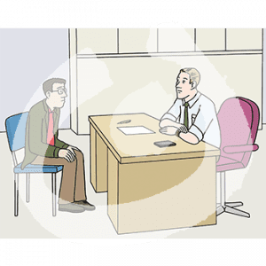 Eine Person sitzt an einem Schreibtisch. Davor sitzt eine andere Person.