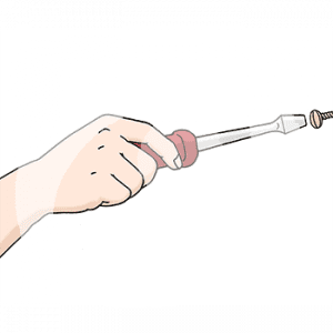 Eine Hand hält einen Schraubenzieher vor eine Schraube.