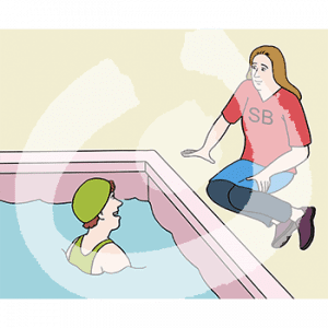 Eine Person in einem Schwimmbecken. Sie guckt zu einer Person die neben dem Schwimmbecken sitzt.