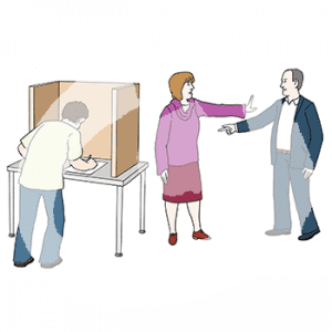 Eine Person steht an einem Tisch mit Sichtschutzwänden. Vor ihr liegt ein Zettel. Im Hintergrund zeigt eine Person auf eine andere Person die mit abwehrend erhobener Hand neben dem Tisch steht.