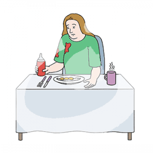 Eine traurige Frau sitzt an einem Tisch. Vor ihr steht ein Becher und ein Teller mit Essen. In der Hand hält sie eine Flasche mit rotem Inhalt. Der Inhalt ist auch auf ihrem Shirt.