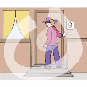 Eine Frau steht vor einer Tür und hat einen Finger auf dem Klingelknopf.