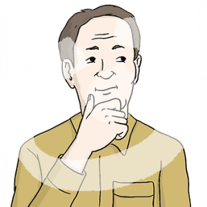 Portraitansicht eines nachdenklichen Mannes der sich die Hand ans Kinn hält.