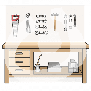 Eine Werkbank. An der Wand hängen geordnete Werkzeuge an Halterungen.