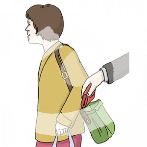 Eine Hand nimmt ein Portemonnaie aus der Handtasche einer Person.