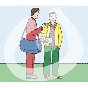 Eine Person mit rotem Trainingsanzug. Sie legt einer Person mit gelber Trainingsjacke und Gips Arm eine Hand auf die Schulter.