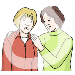 Eine Person legt einer traurigen Person seitlich zwei Hände um die Schultern.