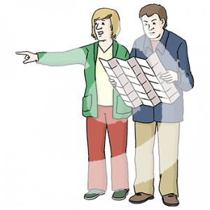 Eine Person guckt in eine Karte. Daneben steht eine Person und zeigt in eine Richtung.