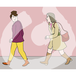 Eine Person läuft einer anderen Person hinterher. Sie dreht sich um.