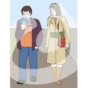 Eine fröhliche Person hält Spielkarten in der Hand. Daneben läuft eine andere fröhliche Person.