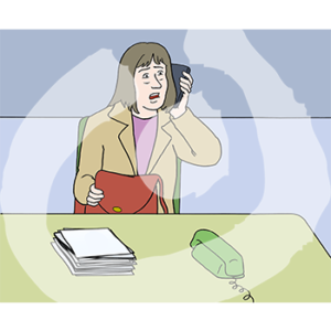 Eine erschrockene Person sitzt an einem Tisch und telefoniert.