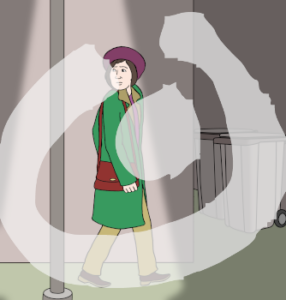 Eine ängstliche Frau geht auf einem Fußweg. Sie guckt über ihre Schulter.