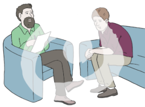 Eine traurige Person sitzt vorgebeugt auf einem Sofa. Daneben sitzt ein Mann mit Zettel und Stift auf einem Sessel.